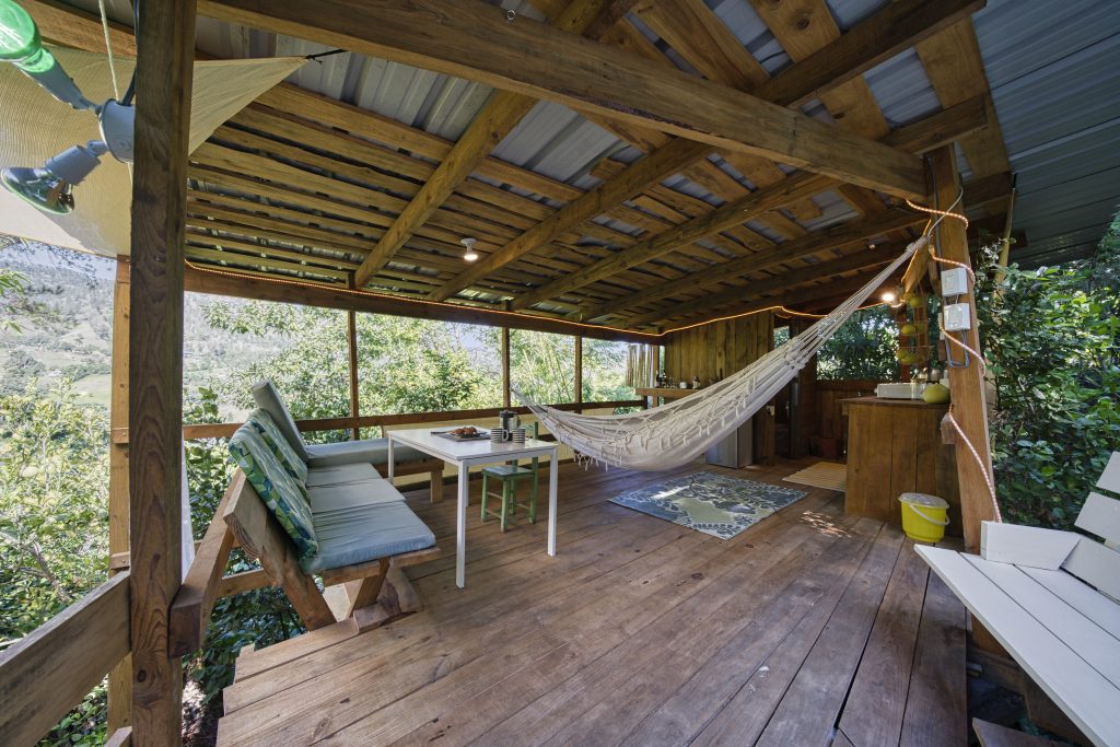 Swing in the hammock upstairs in the echo-friendly cottage