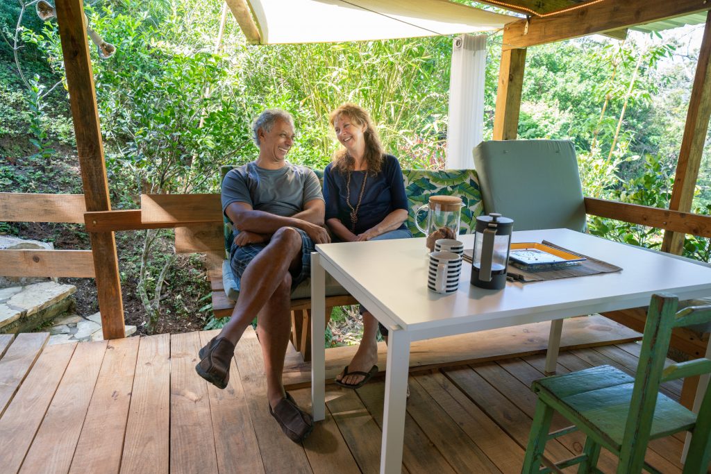 Your team sitting at the table in your vacation rental